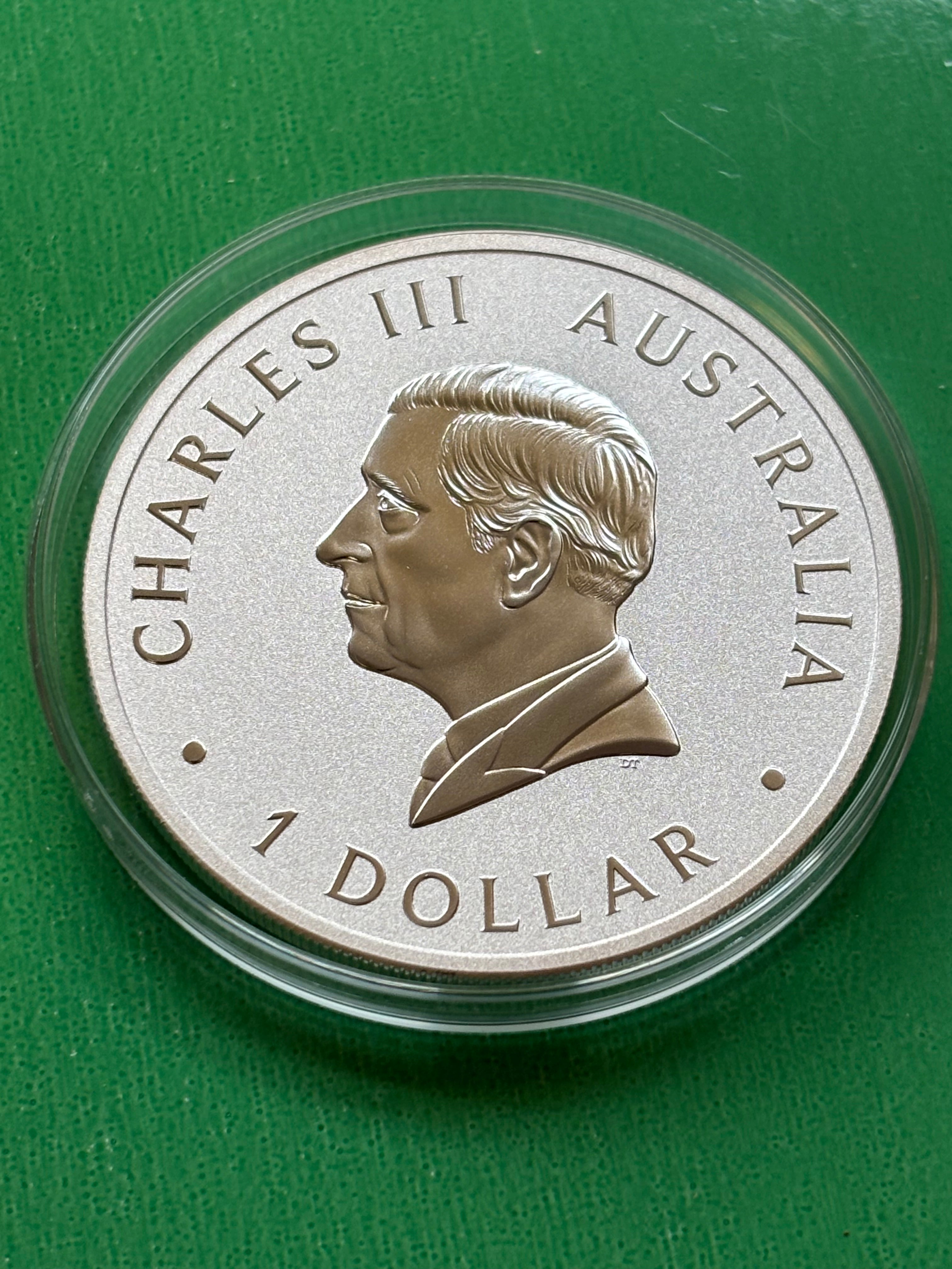 A 1oz .9999 silver coin named "Kookaburra 2024," featuring a left-facing profile of Charles III and the inscription CHARLES III AUSTRALIA 1 DOLLAR, displayed on a green background.